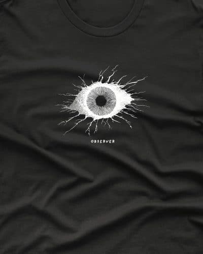 a black shirt with a white eye